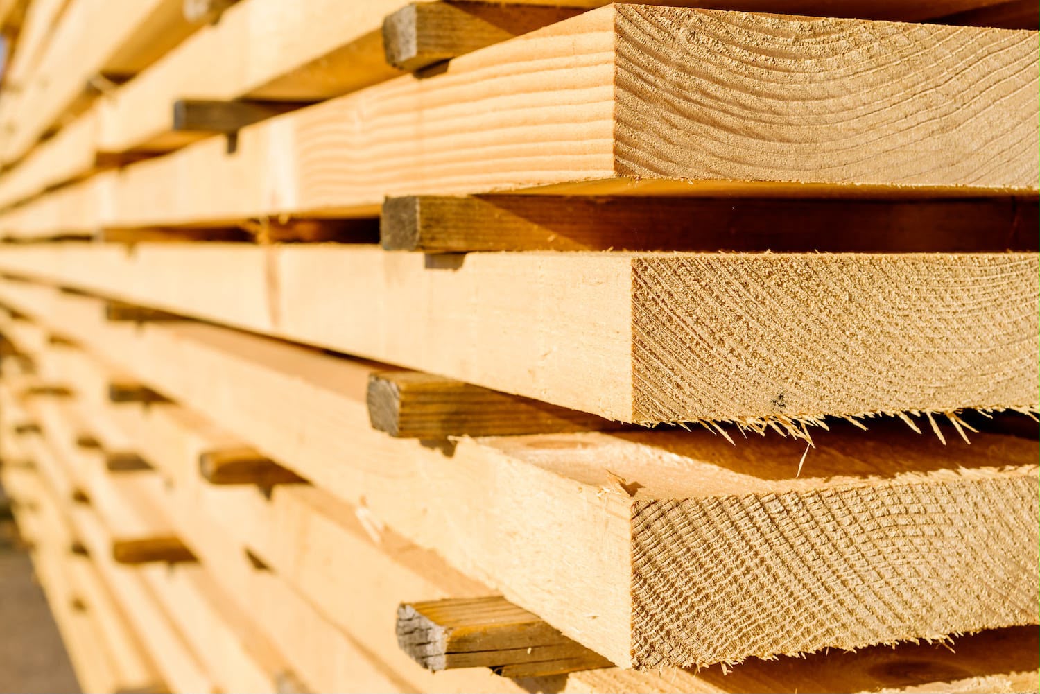 Stacked sawn timber planks
